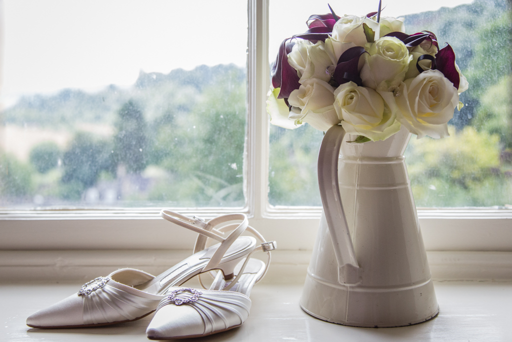 Brides shoes and flowers